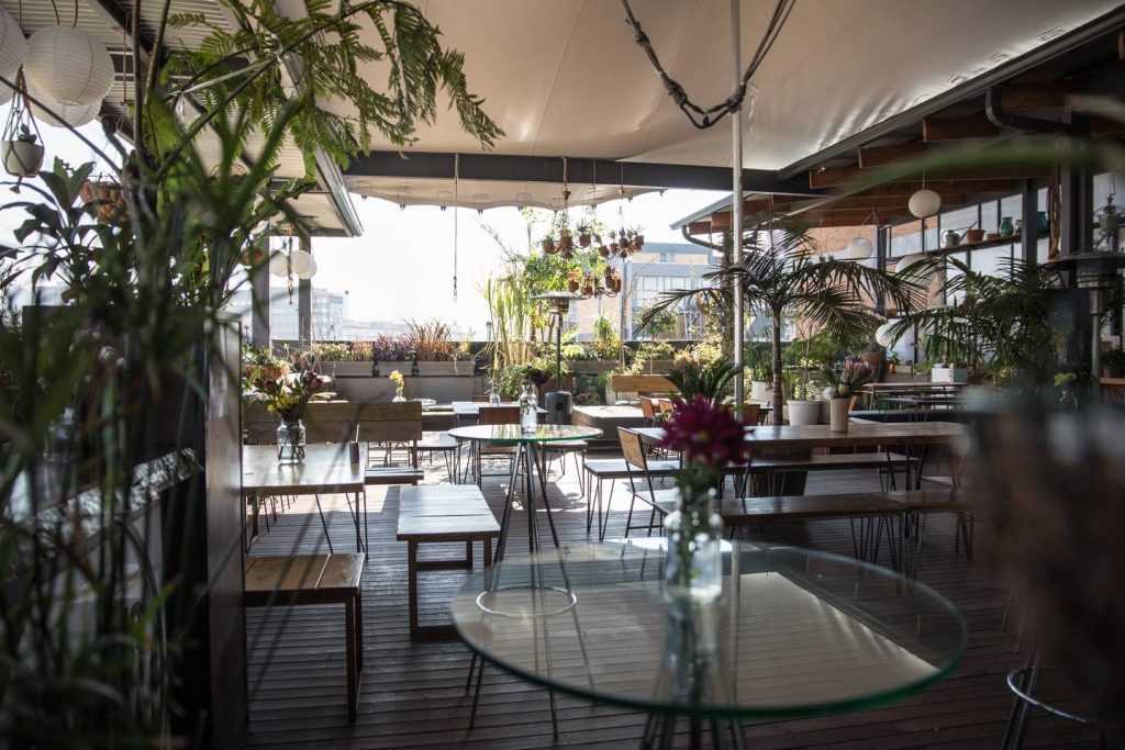 venue with furniture and plants living room